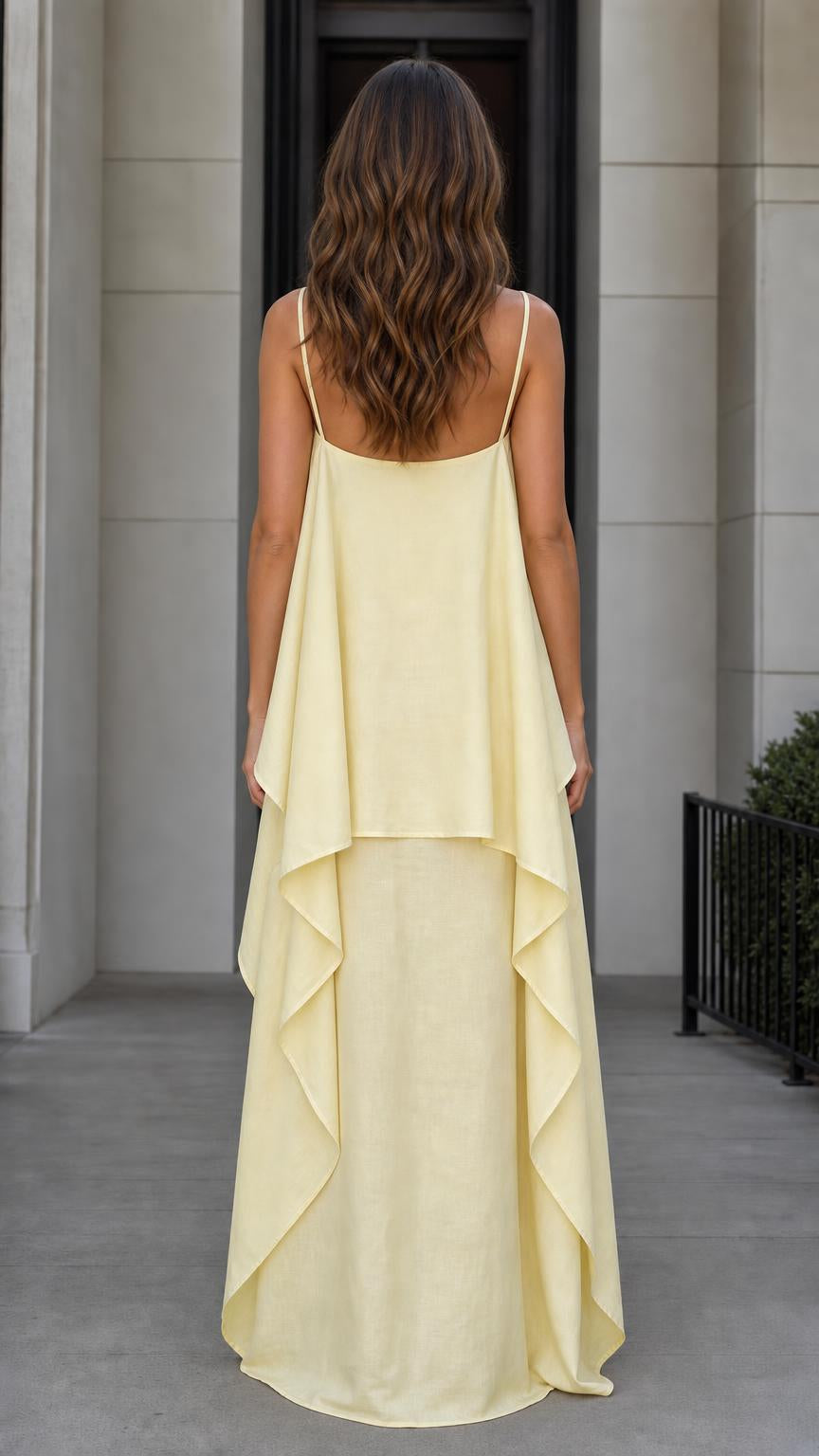 Back view of model in the yellow maxi dress