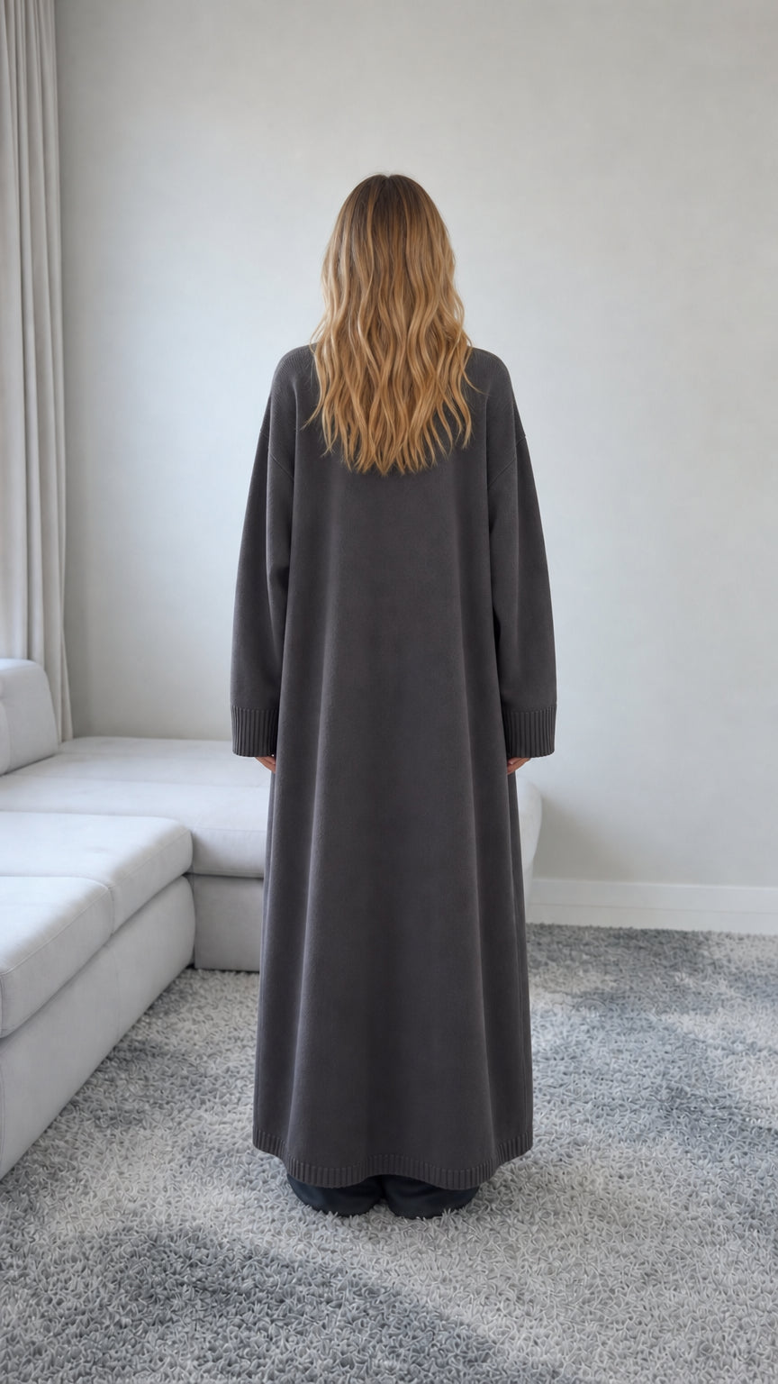Back view of model wearing a Charcoal Grey full length button down cardigan