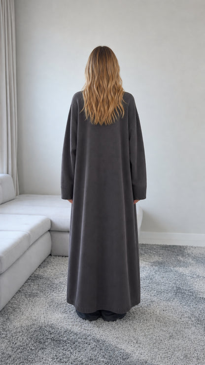 Back view of model wearing a Charcoal Grey full length button down cardigan