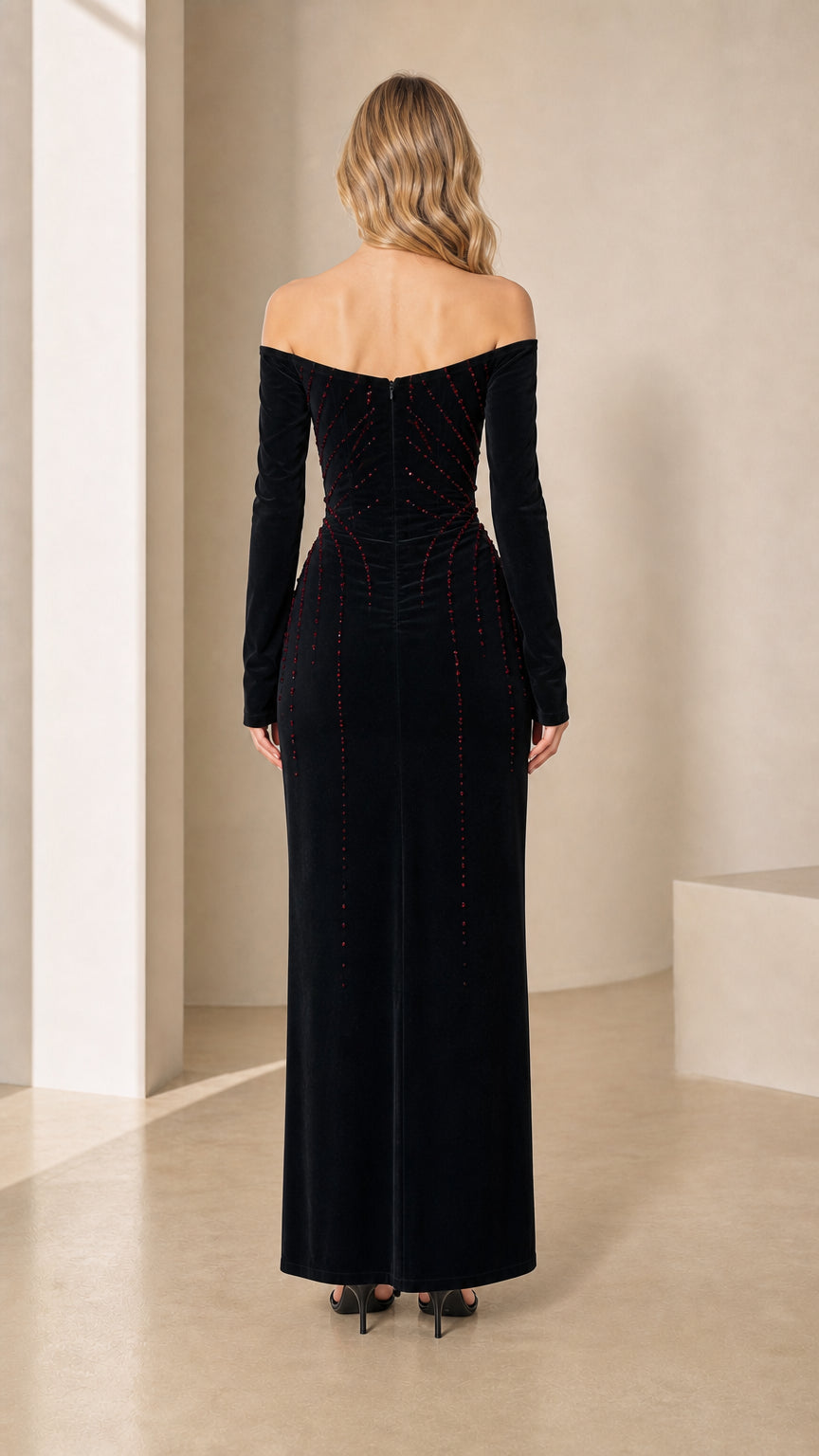 Back view of black off-the-shoulder long sleeve maxi dress