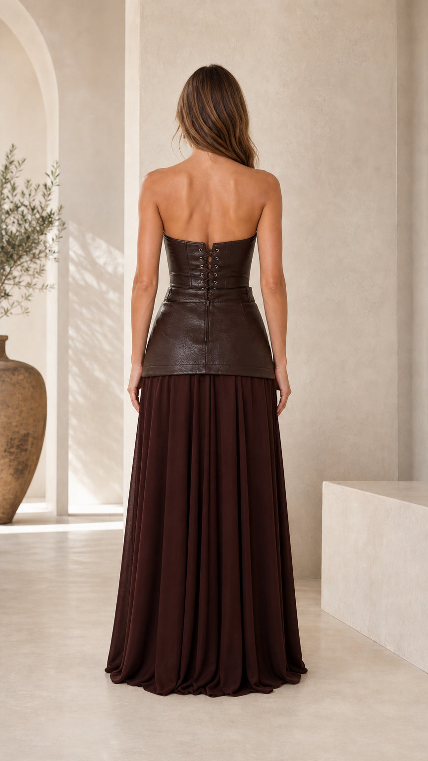 Back view showing lace-up detail of brown corset maxi dress