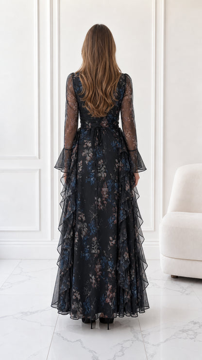 Back full-length view of black floral long sleeve maxi dress