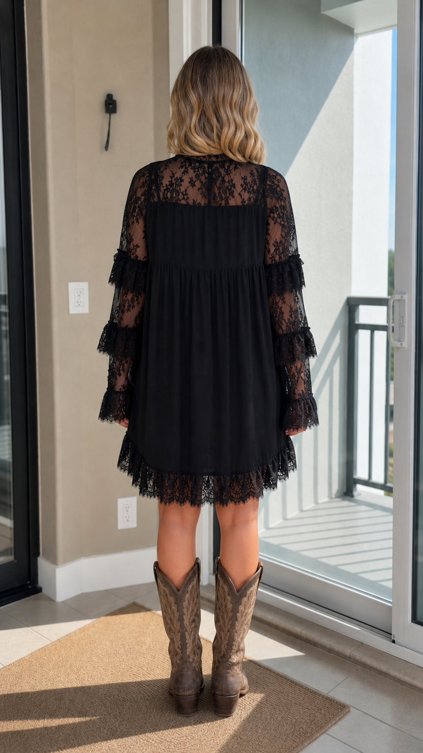 Back view of black lace mini dress