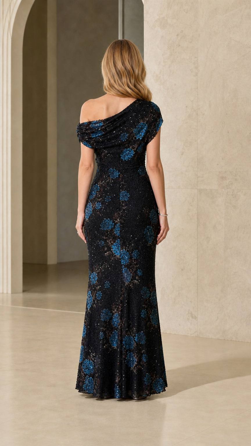 Back view of model in black sequin floral maxi dress