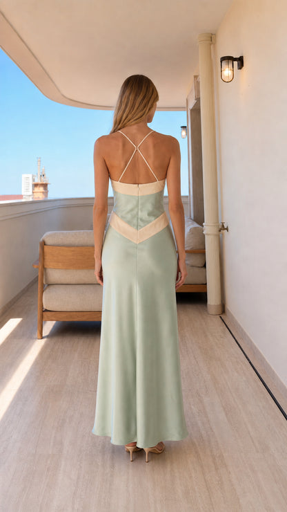 Back view showing criss-cross straps of sage satin halter dress