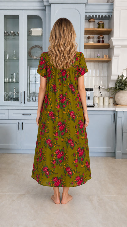 Back view of model wearing flowy olive green floral maxi dress