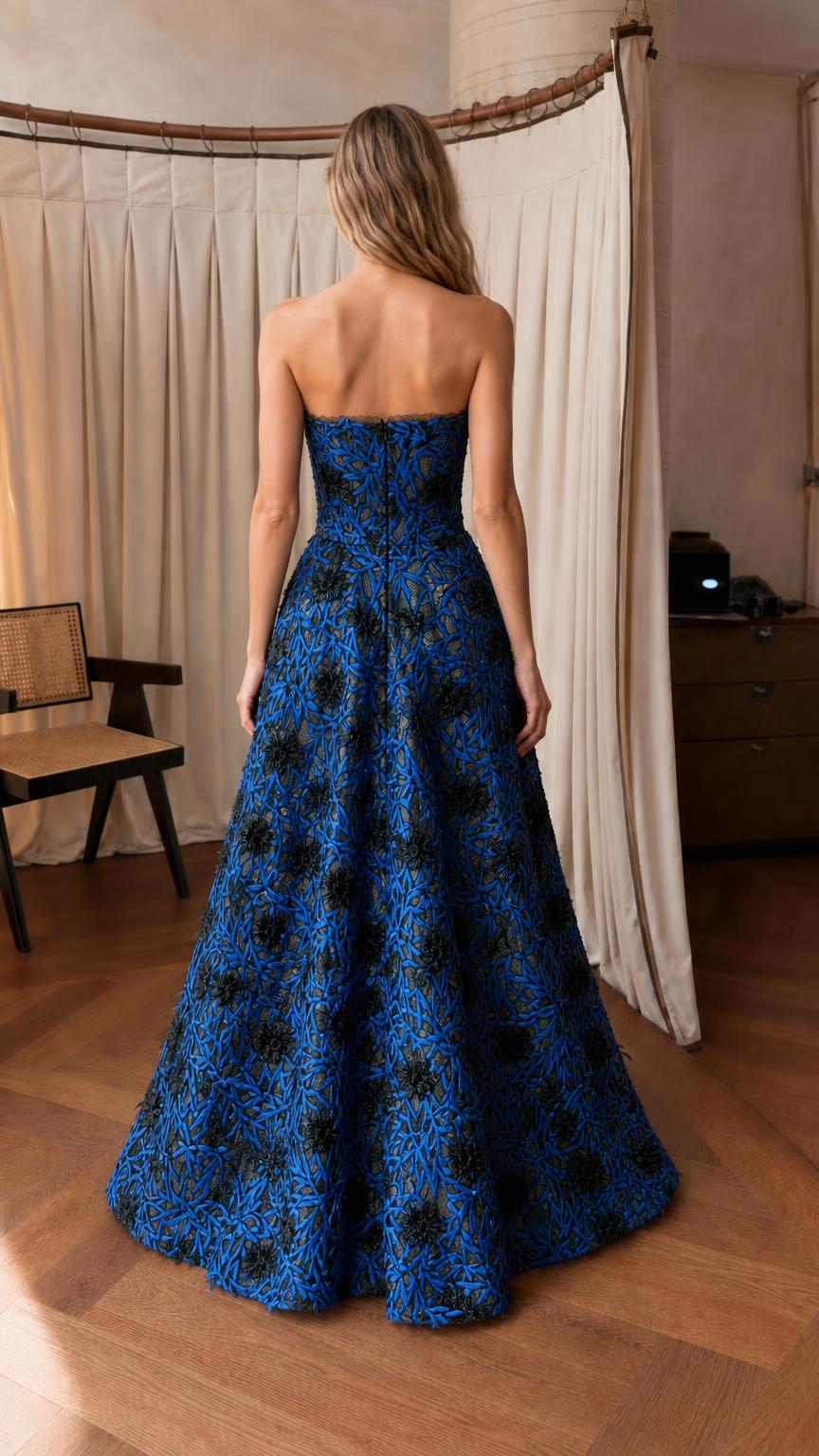 Back view of royal blue strapless maxi gown