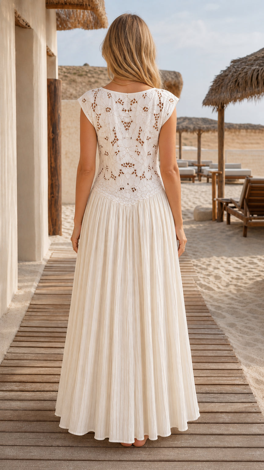 Model wearing white boho crochet lace maxi dress, back view
