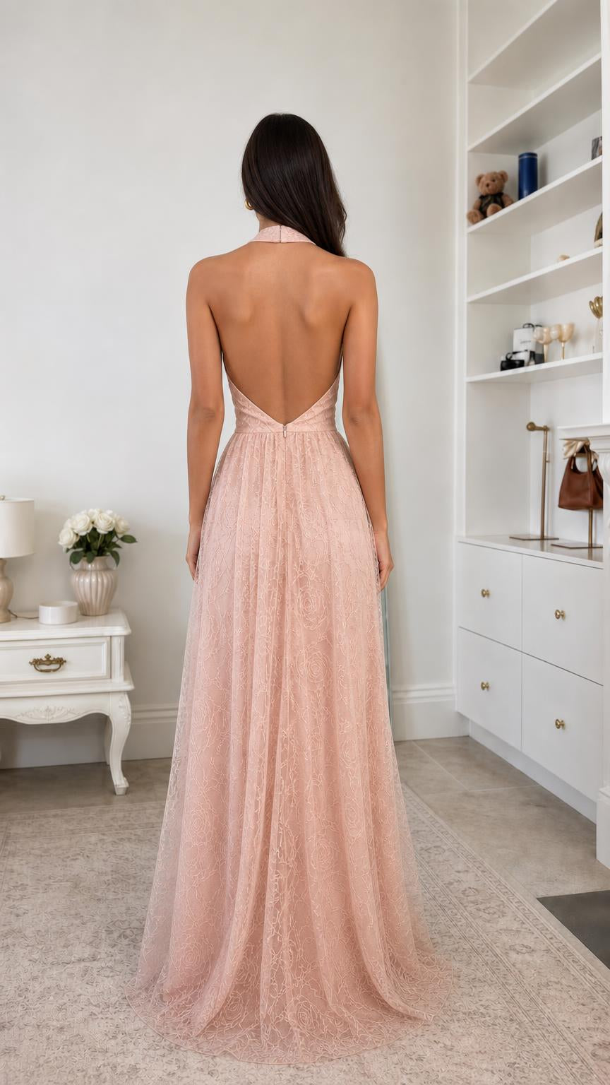 Back view showing open back design of blush pink lace gown
