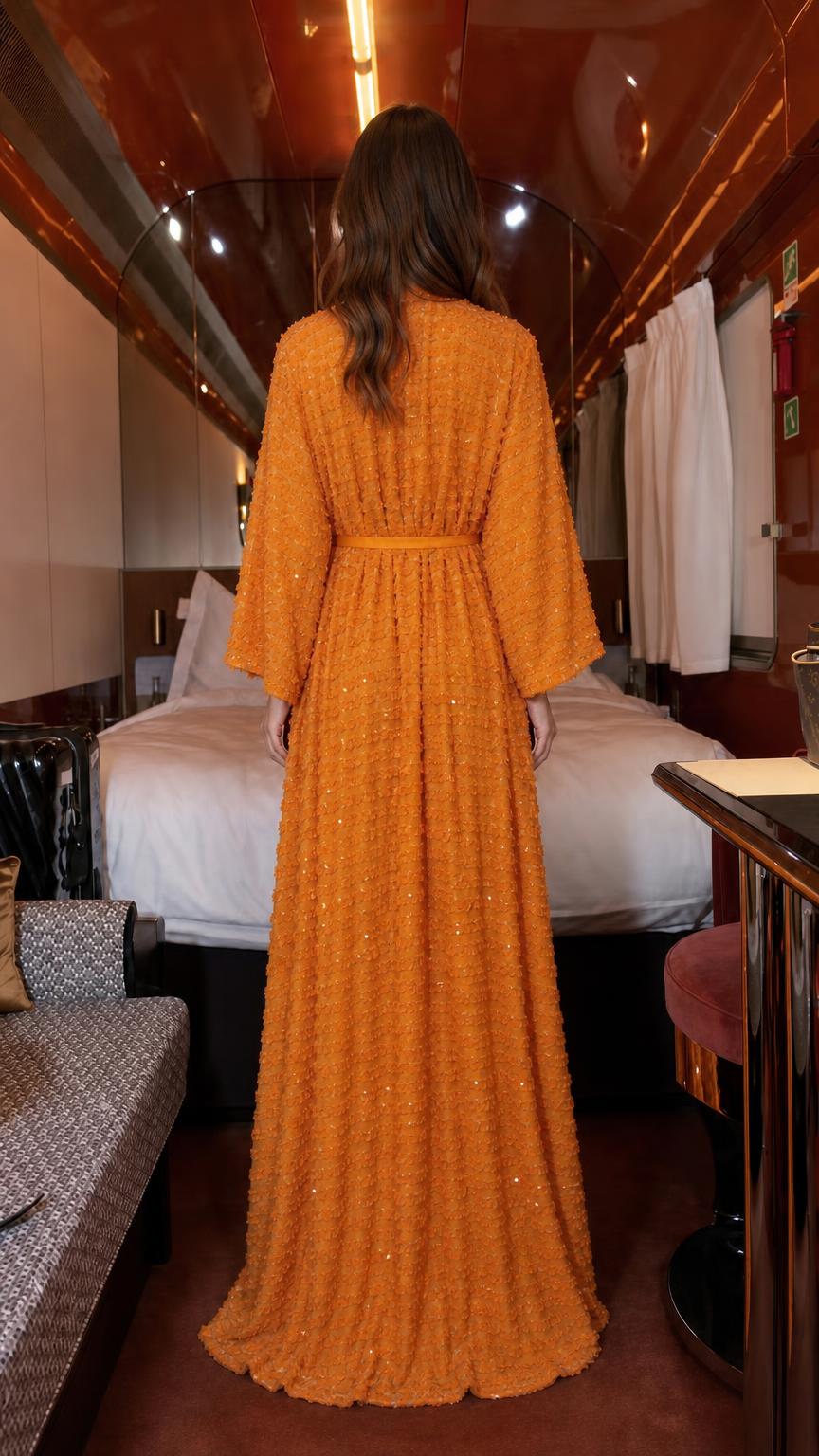 Back view of orange textured sequin maxi dress