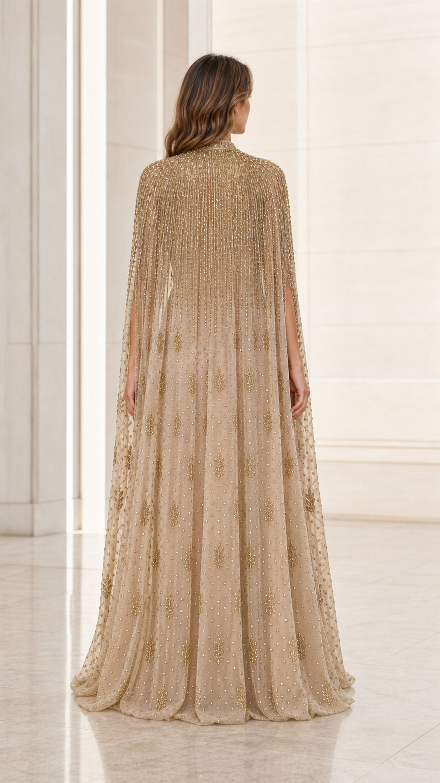 Back view of champagne gold floor-length beaded cape dress