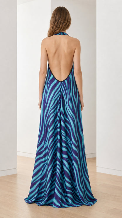 Back view showcasing open back design of blue zebra print dress