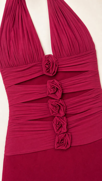 Close-up of the front bodice with rosette and cutout details on Fuchsia dress