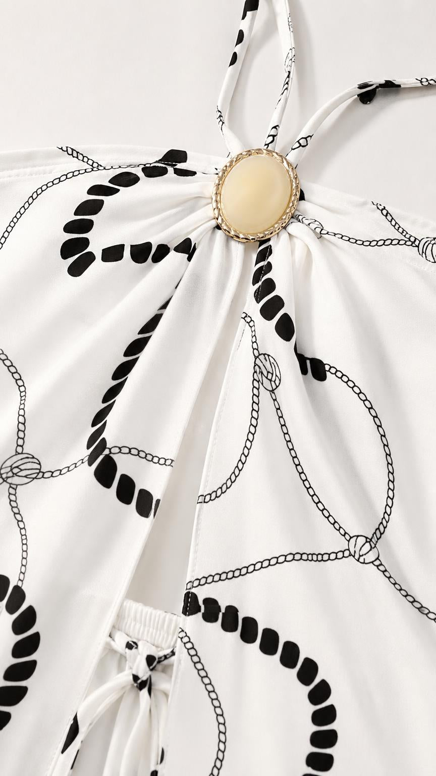 Close-up detail of halter neckline ornament and rope pattern