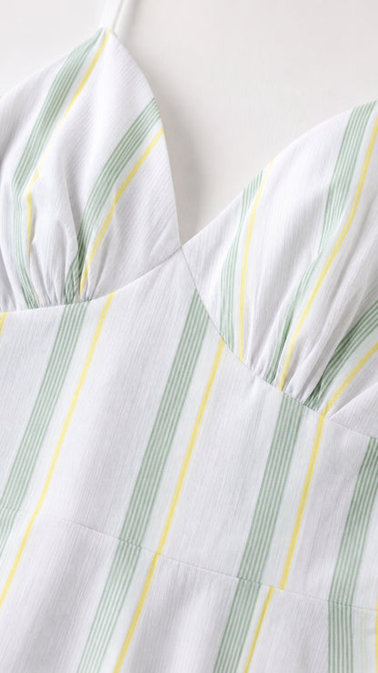 Close-up detail of the gathered bodice and vertical stripe pattern