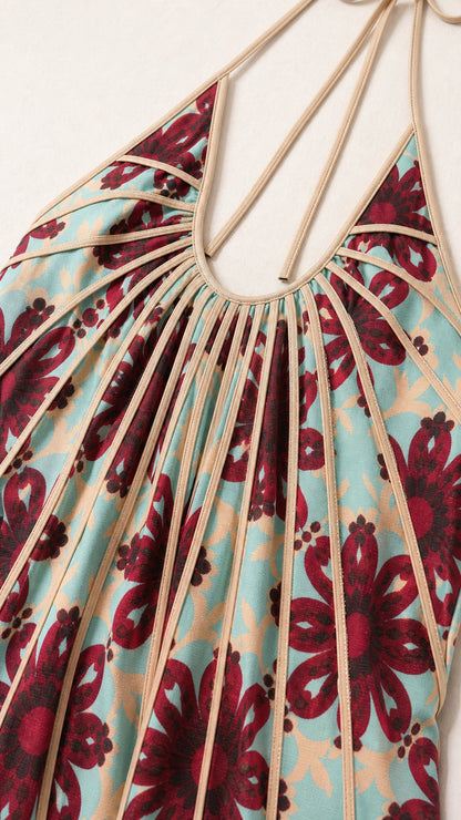 Close-up of halter neckline and pleated fabric details
