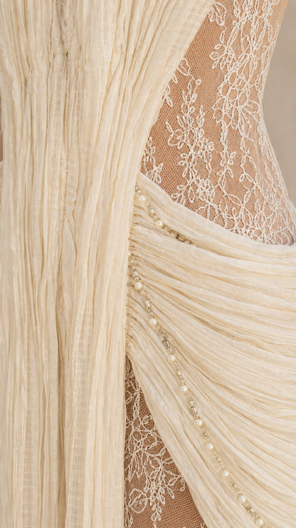 Close-up of lace panel and beaded waist detail