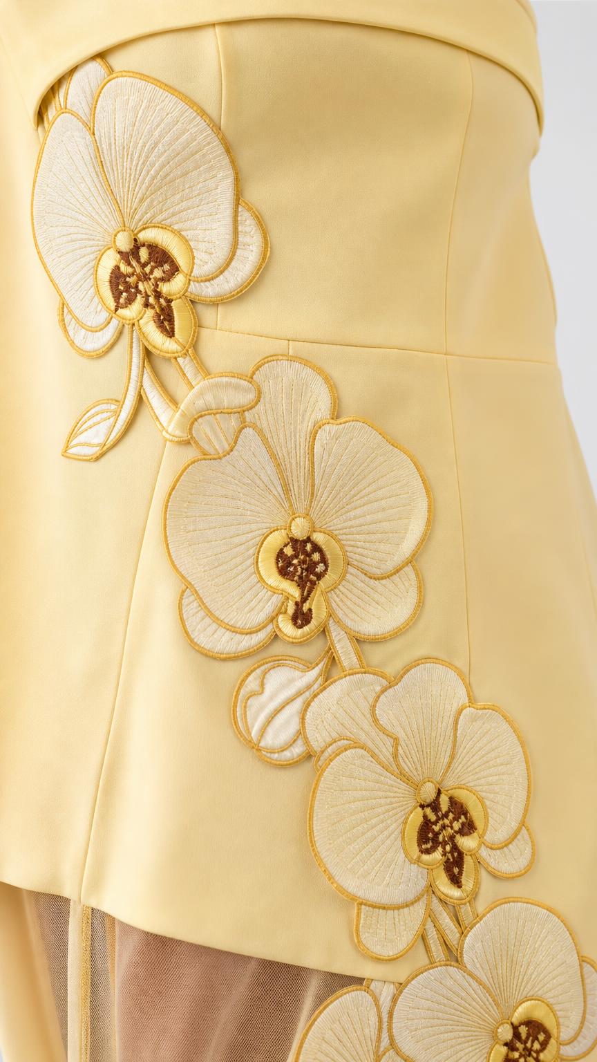 Close up detail of 3d floral embroidery on dress