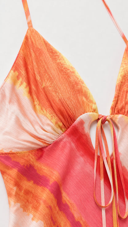 Close up of tie front detail and adjustable straps on maxi dress