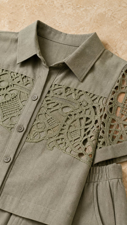 Close-up of the sage green collar, buttons, and lace-look top detailing