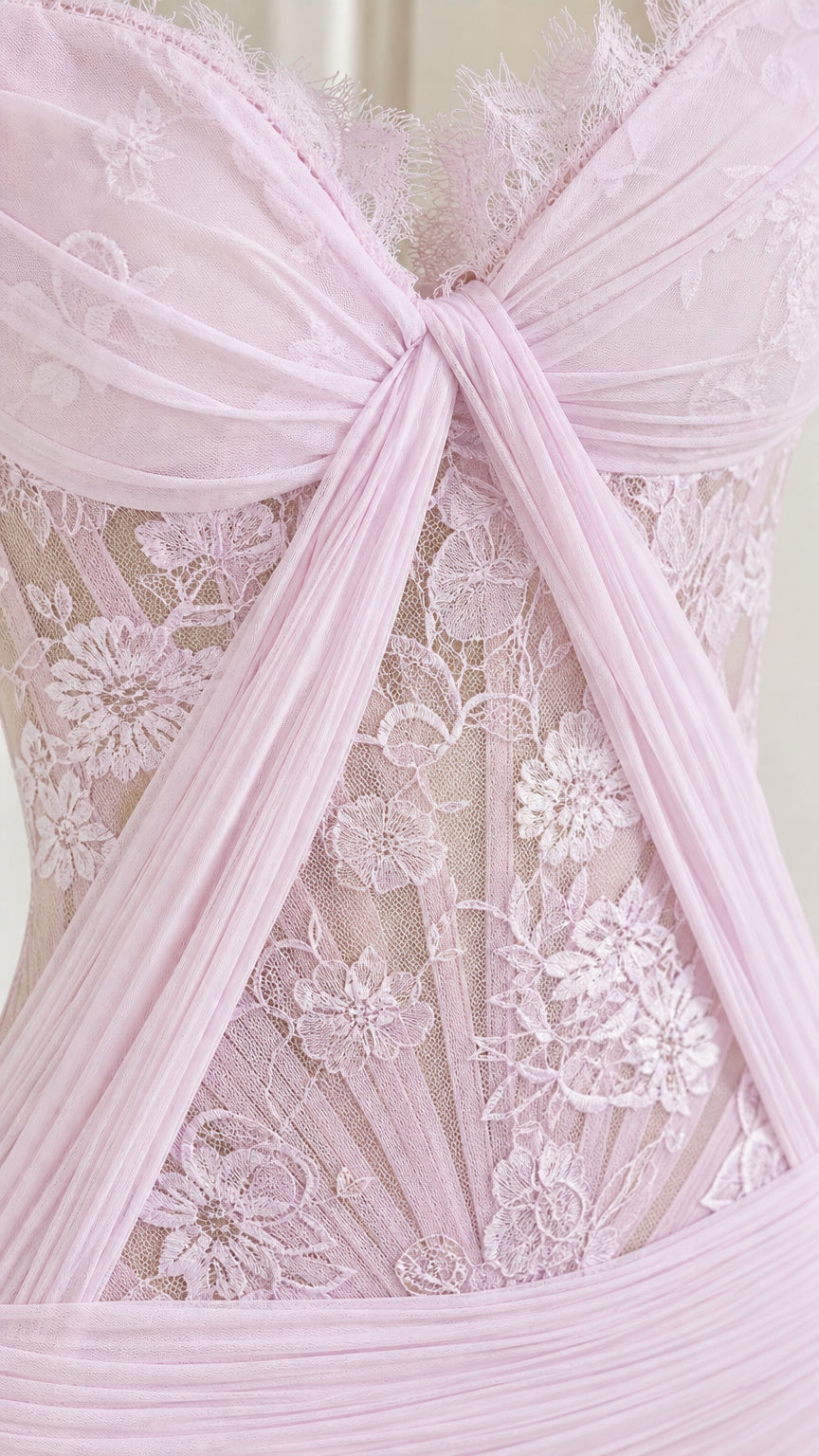 Close up of the intricate lace and pleated bodice detail in lavender