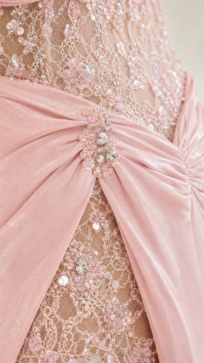 Close-up detail of bodice beading and satin drape in pink