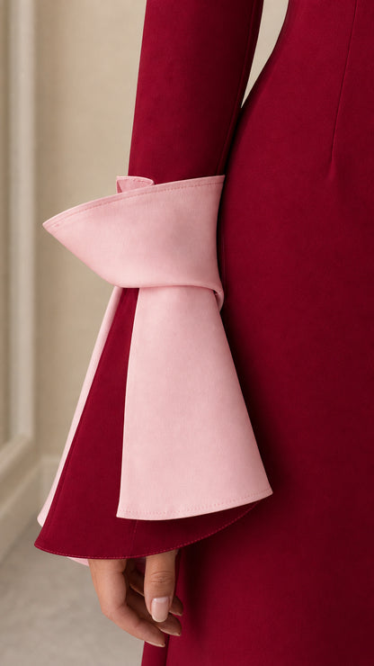 Close-up detail of contrast flared sleeve cuffs