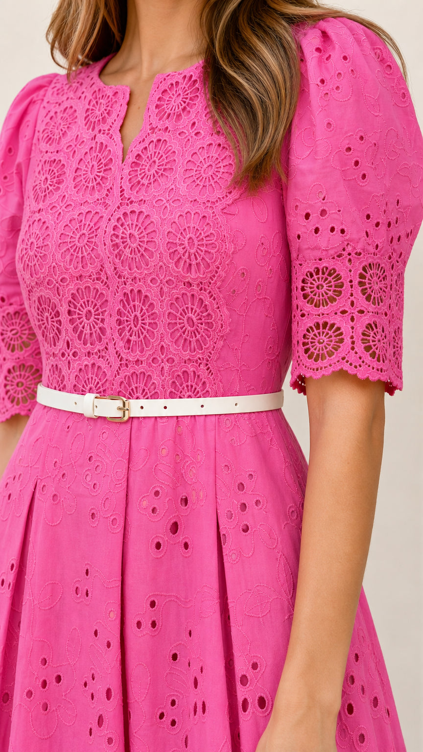 Closeup of bodice and belt detail on hot pink dress