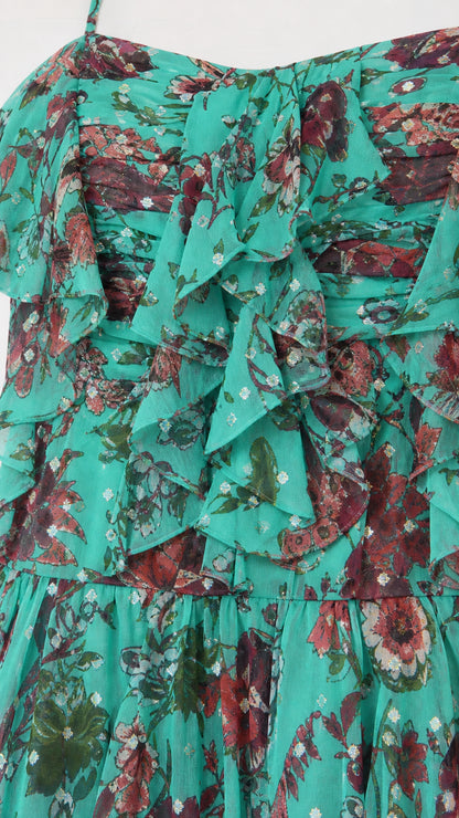 Close-up detail of ruffles and floral print on Teal maxi dress