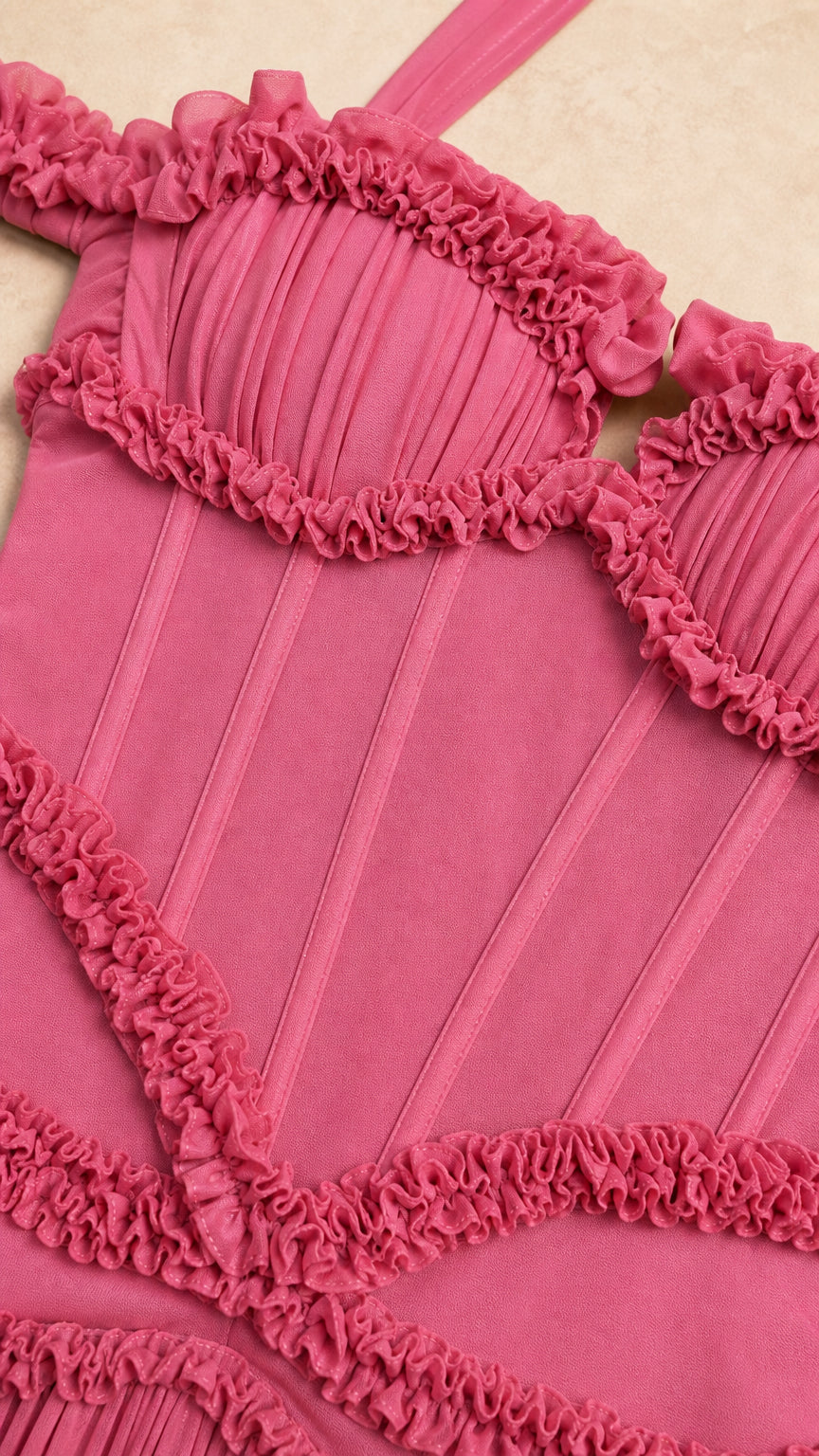 Close up view of corset boning and ruffle trim on Rose Pink gown
