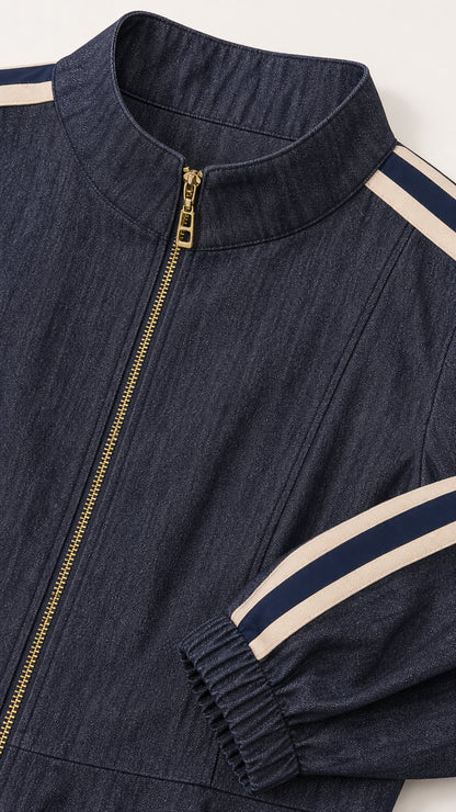 Close-up detail of Navy Blue jacket stand collar, gold-tone zipper, and side sleeve stripe