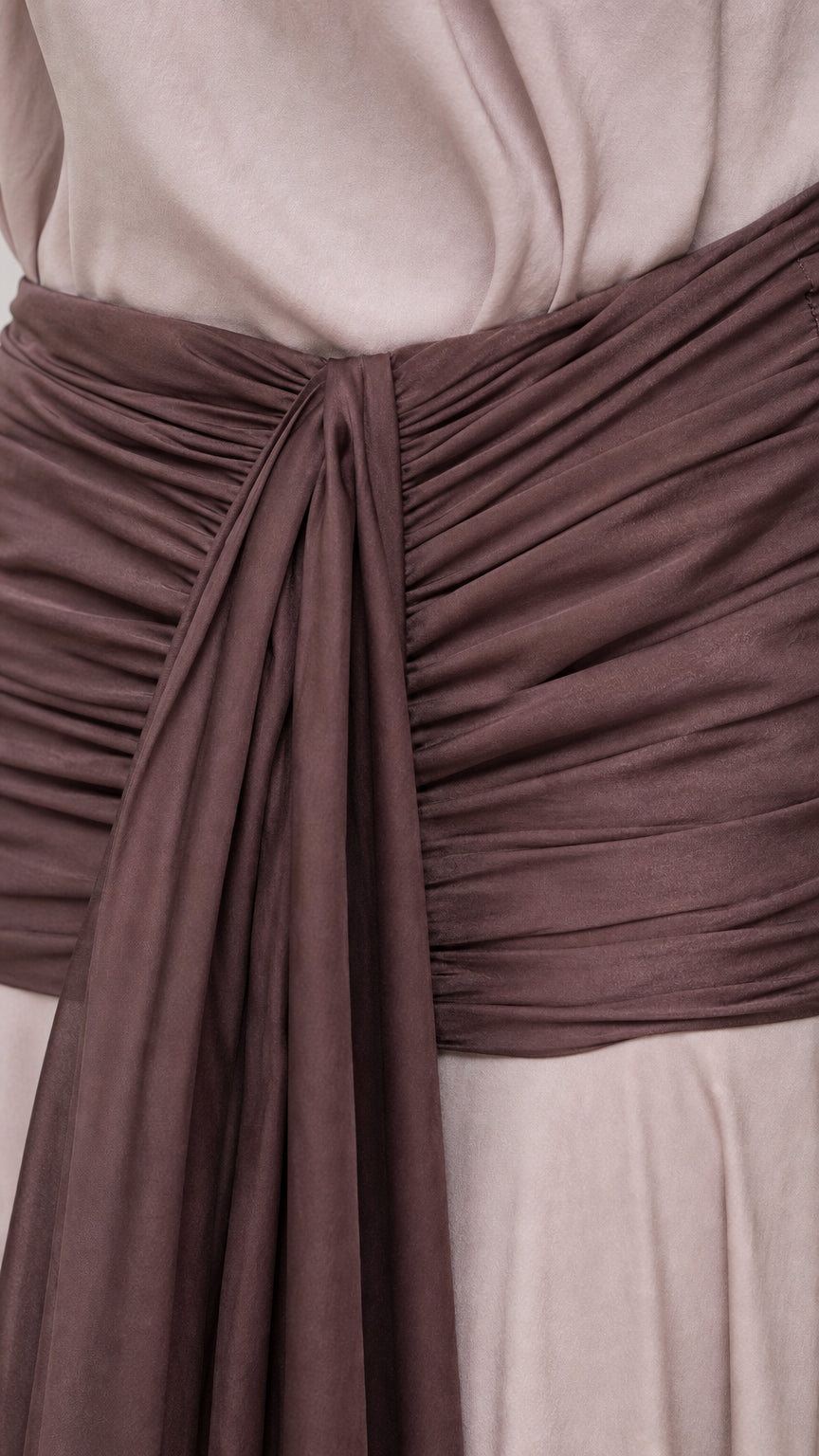 Close-up of ruched waistband and drape detail
