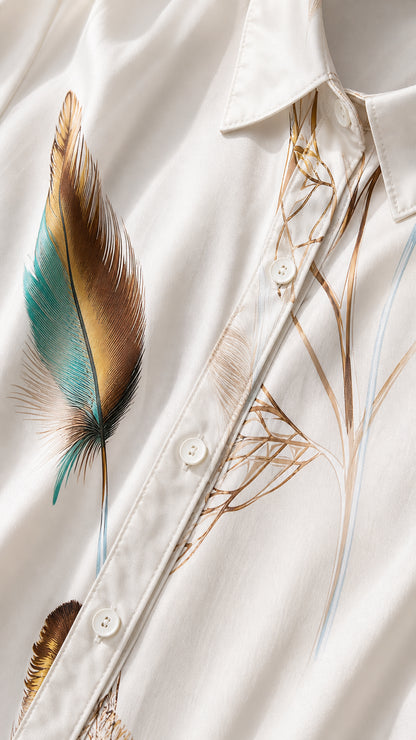 Close-up of button placket and collar on white feather print dress