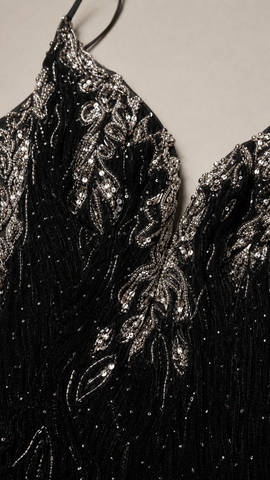 Close-up detail of sequin and bead embroidery on Black dress