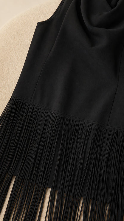 Close-up of fabric texture and fringe hem detail