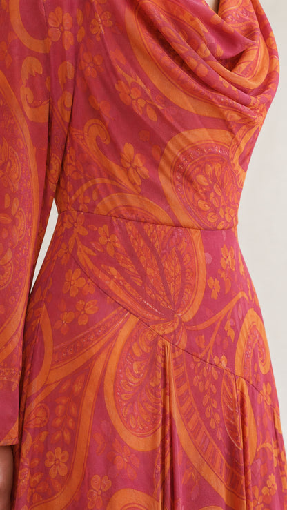 Close-up detail of draped cowl neckline and paisley print