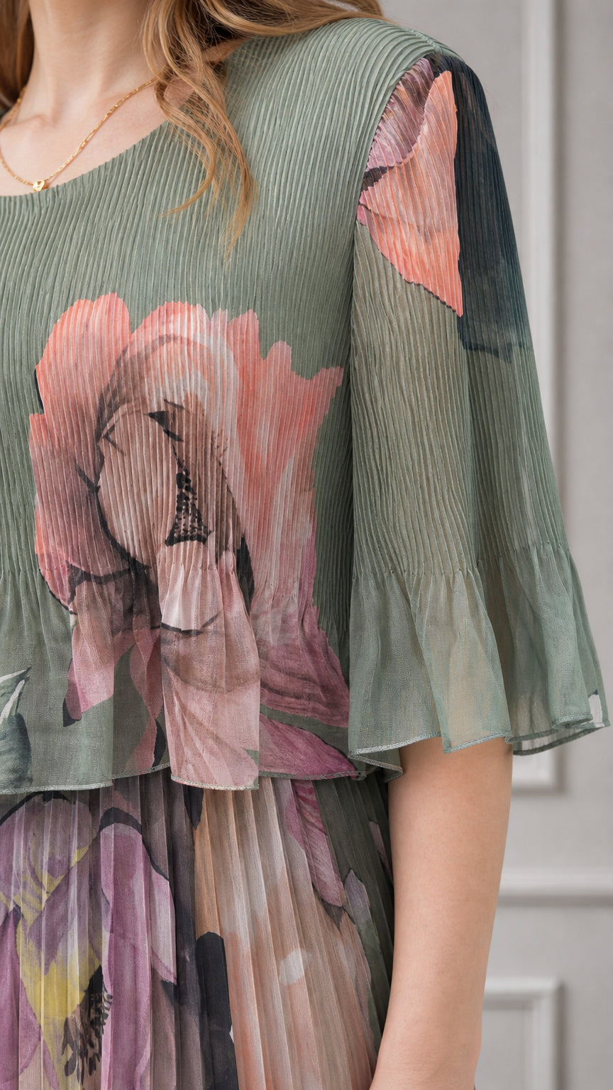 Close-up detail of pleated texture and watercolor floral print on bodice
