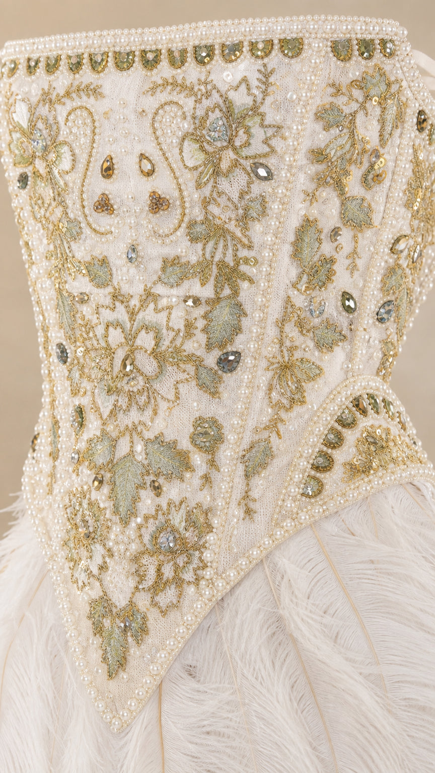 Close up detail of intricate bead embroidery on dress
