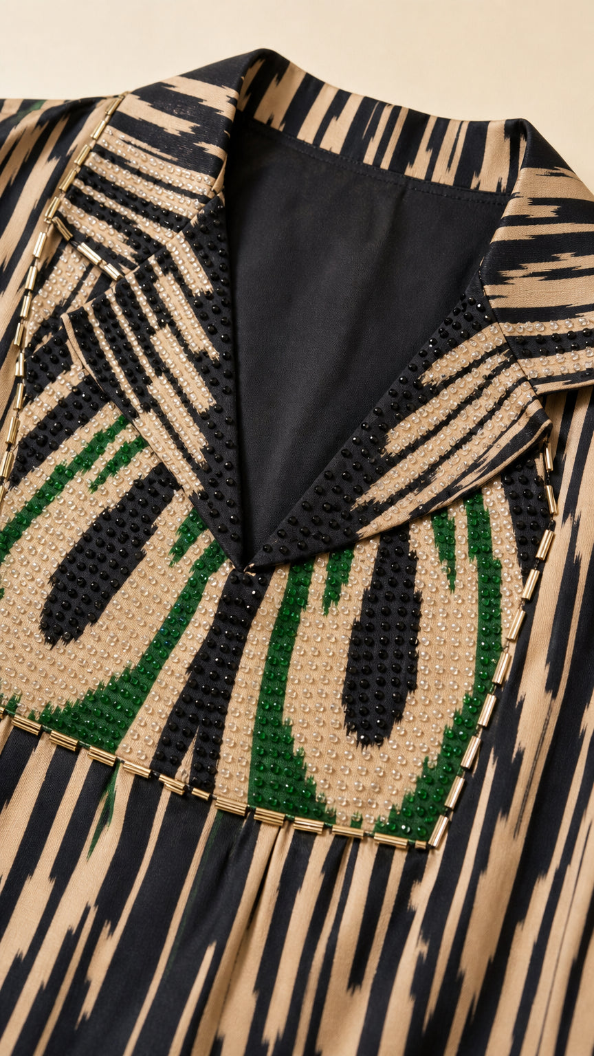 Close-up detail of beaded notch lapel collar and neckline on ikat dress