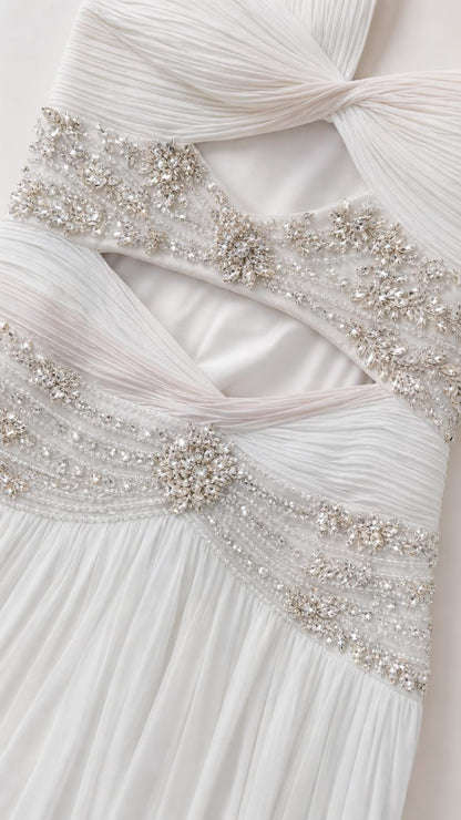 Close-up detail of crystal beaded waist trim and cutouts