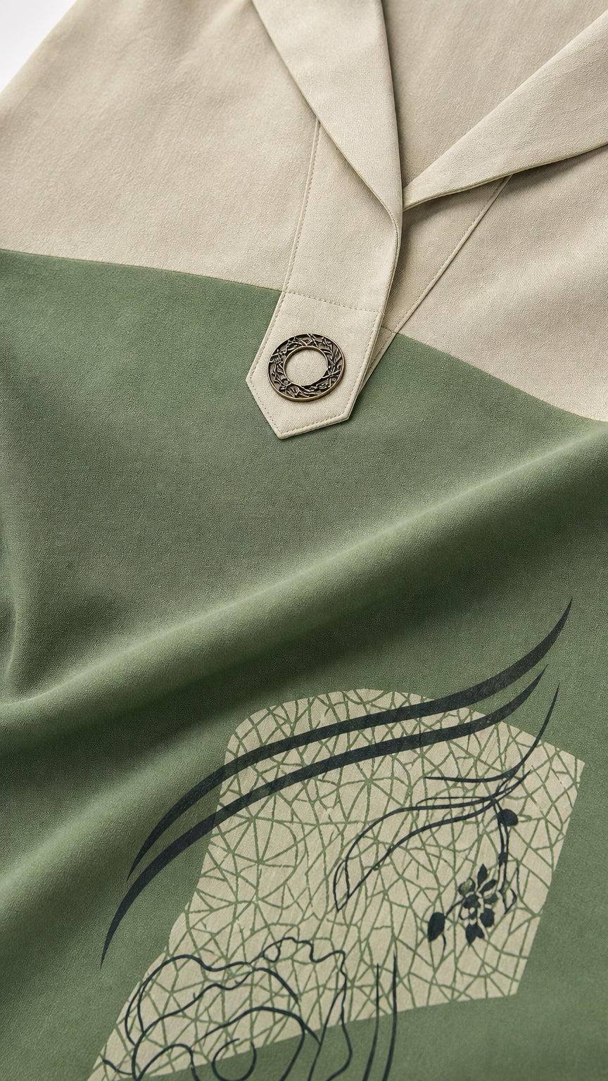 Close up of lapel collar and graphic print detail