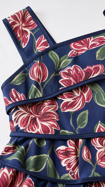 Close-up detail of navy floral fabric and contrast piping