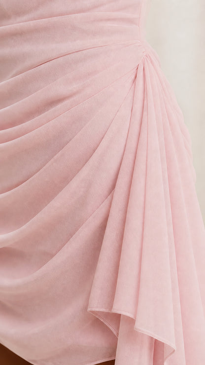Close-up detail of pink chiffon fabric and draping