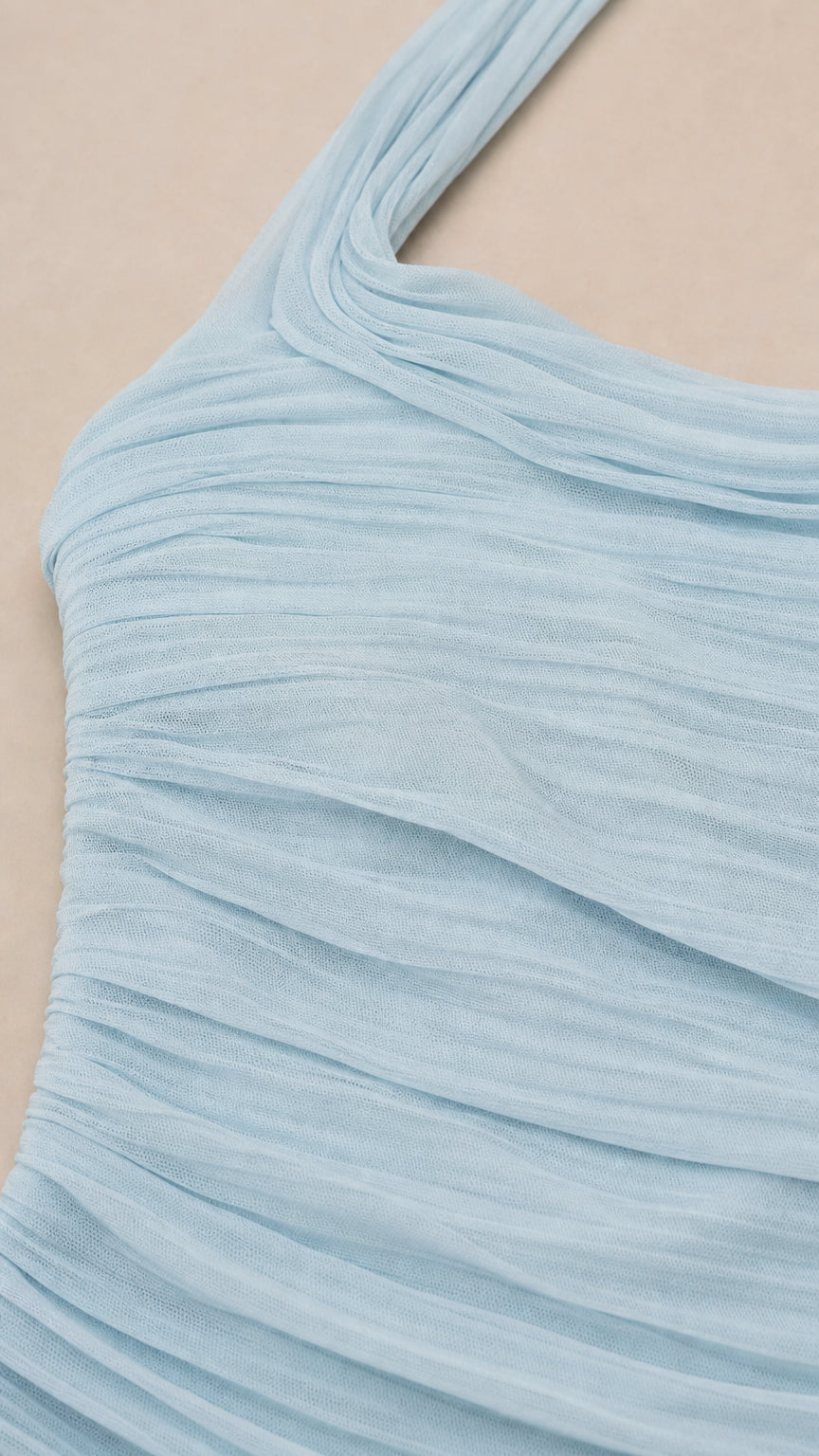 Close-up of ruched mesh fabric texture in Light Blue