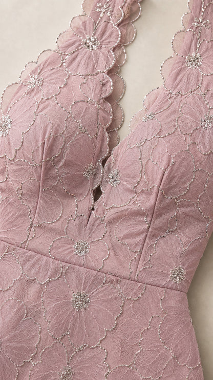 Close-up of floral scalloped plunge halter neckline with beadwork accents