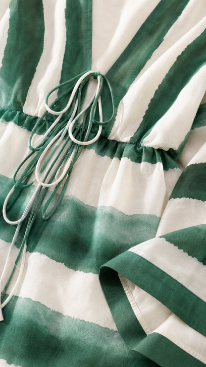 Close-up detail of drawstring waist and fabric texture