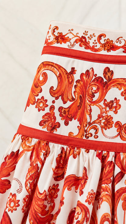 Close-up detail of tiered fabric and piping on the maxi skirt