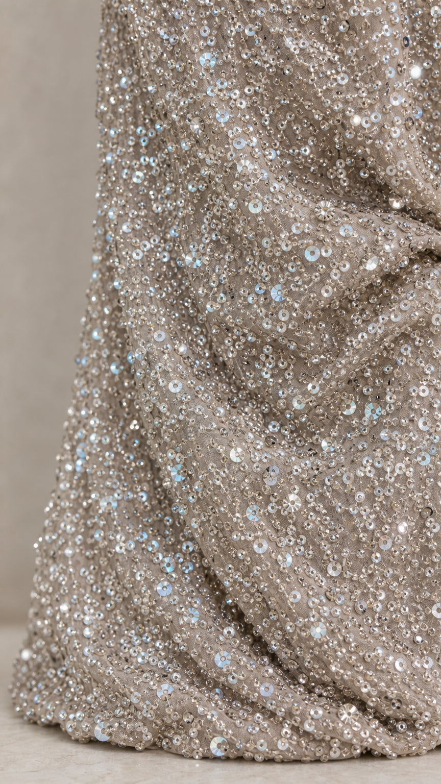 Close-up detail of shimmering silver sequin fabric texture