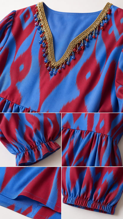 Close-up details of beaded V-neckline, gathered sleeve cuffs, and elastic ankle hem