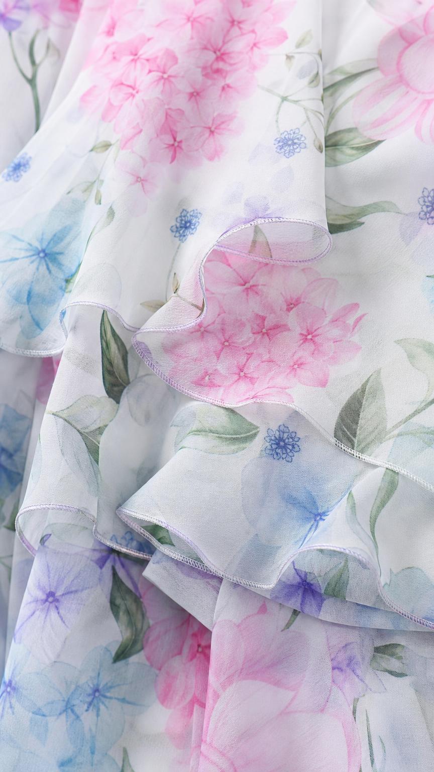 Close-up of lightweight chiffon fabric and ruffle texture with floral print